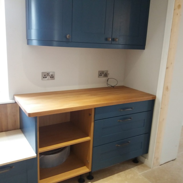 FITTED SOLID OAK WORKTOPS TO PART OF THE KITCHEN