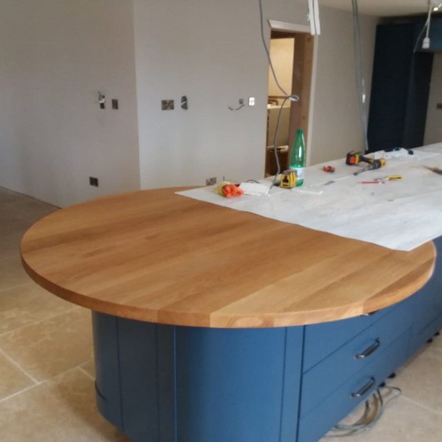 FITTED SOLID OAK WORKTOPS TO PART OF THE KITCHEN