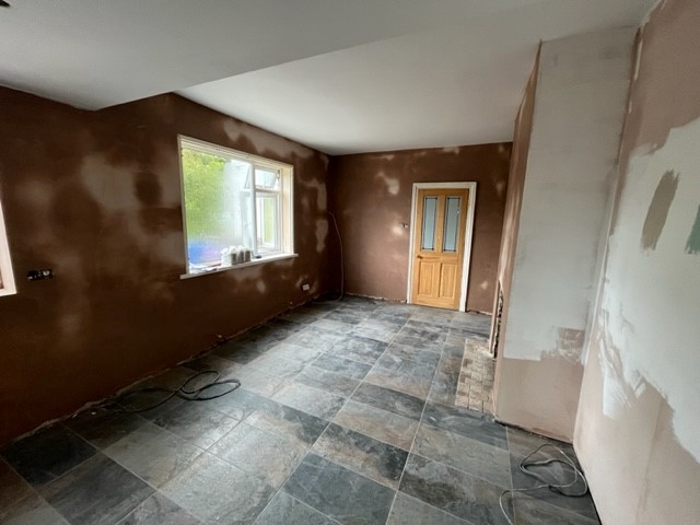 PLASTERED AND TILED