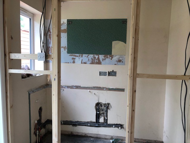 OLD KITCHEN AND WALL OUT FIRST FIX ELECTRICS DONE
